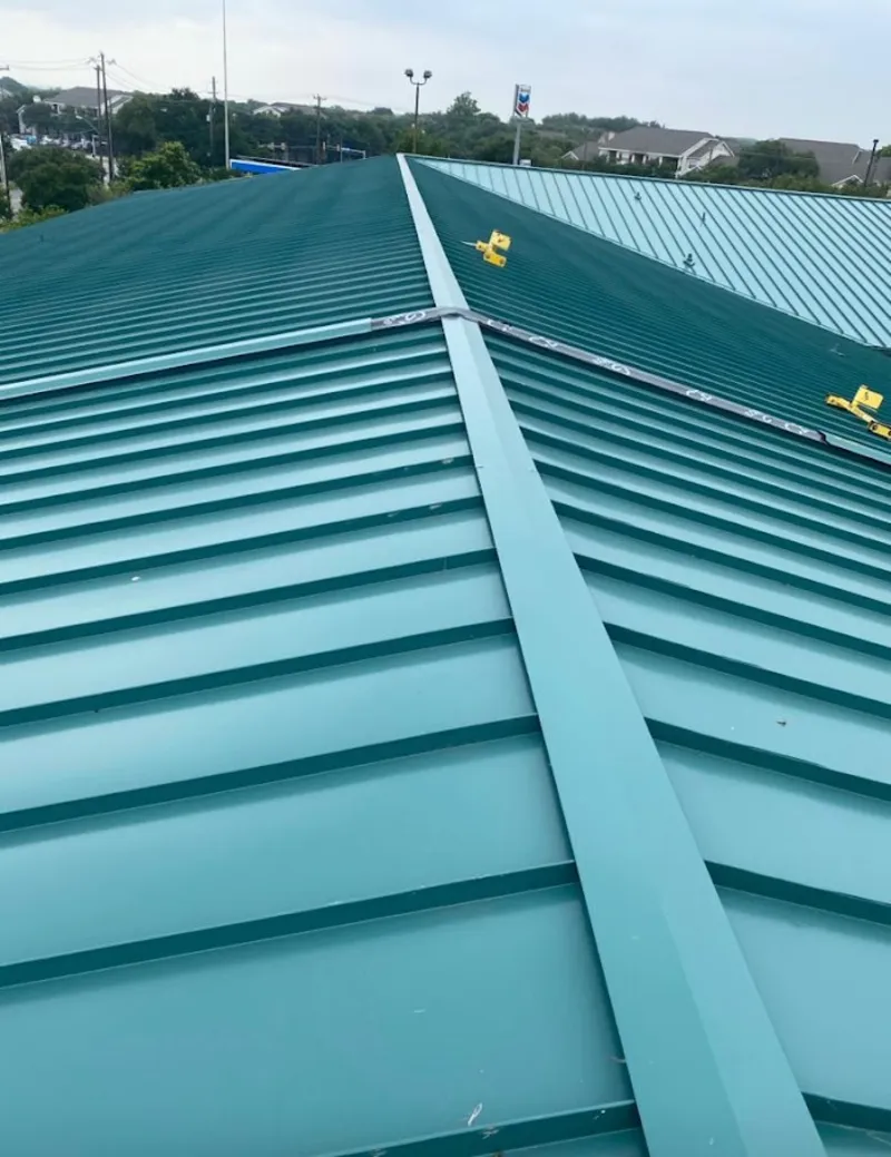 Green commercial metal roof ridge and valley for Metal Roof Repair in Hingham