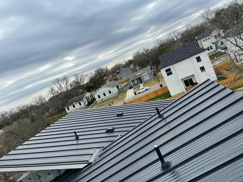 Standing seam metal roof panels with vents for Skylight Repair in Hingham